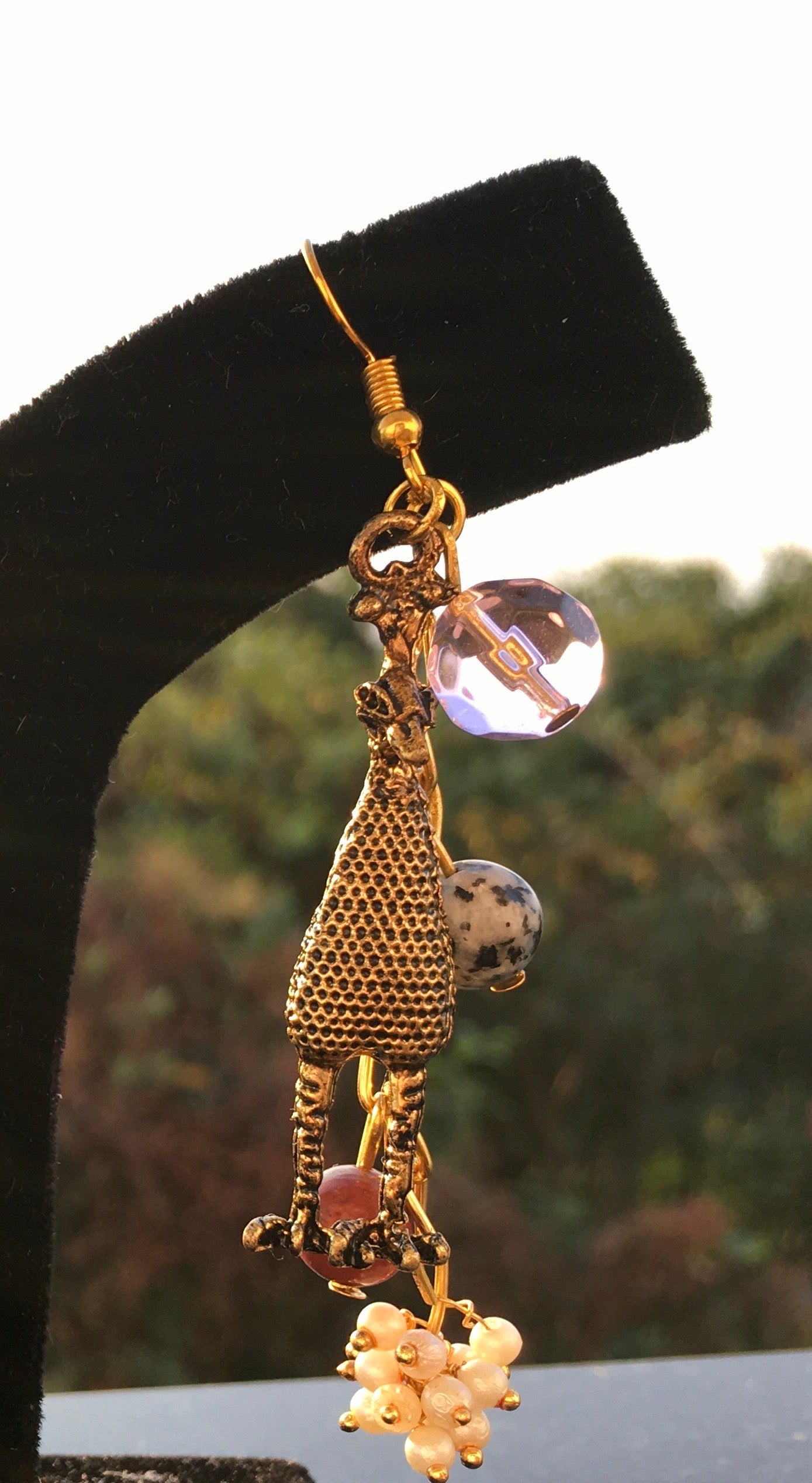 These whimsical earrings, combining sodalite, jasper and delicate pearls, balance your energy, fostering intuition, clarity and a sense of belonging. Plus they are jEarringsSpectakBig Bird Bliss