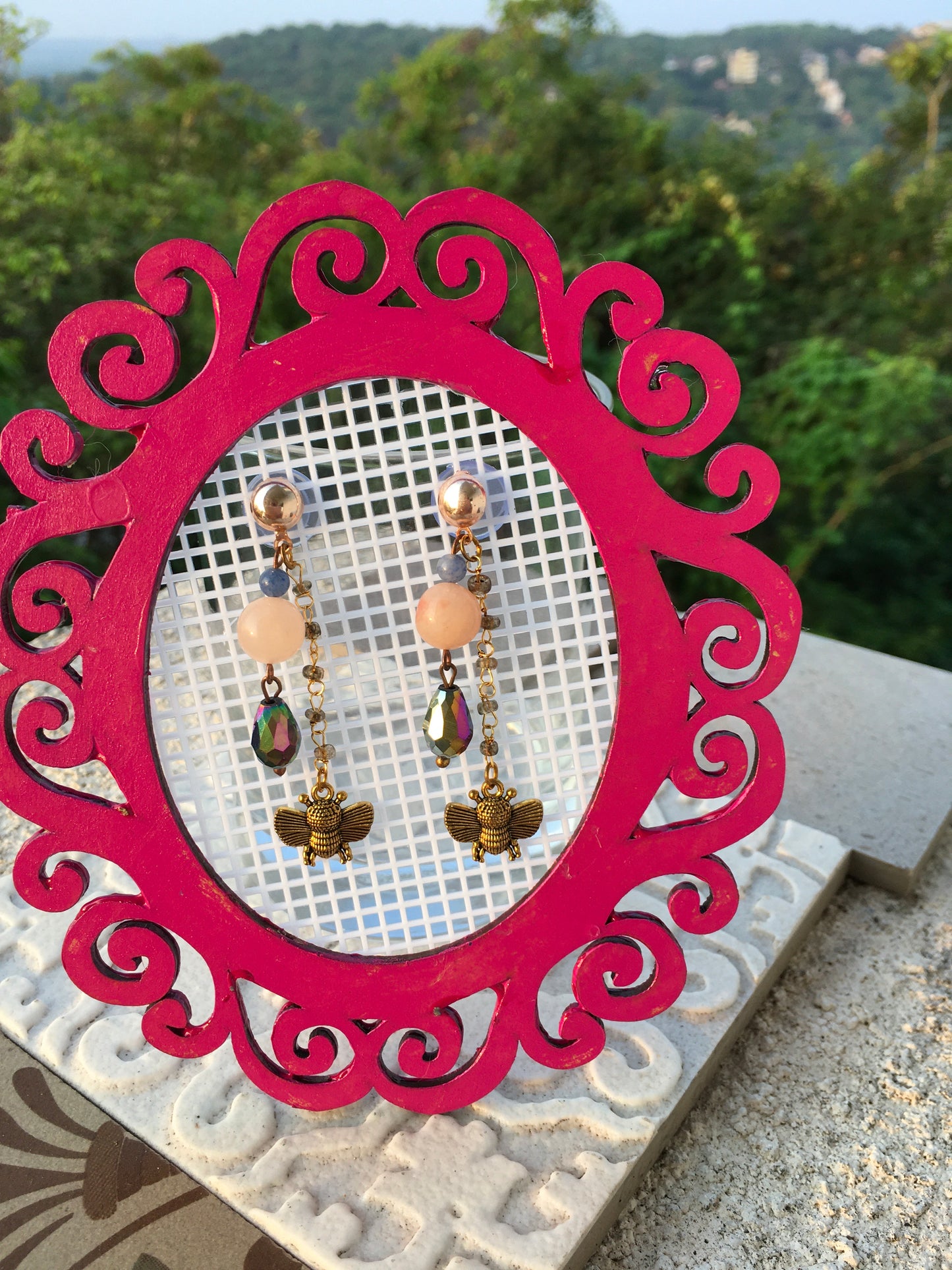 Indulge in the sweet harmonies of life with these enchanting morganite and blue aventurine earrings , adorned with delicate bee charms.
Morganite fosters love, compaEarringsSpectakBee mined
