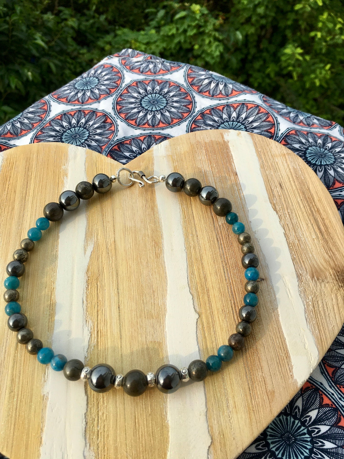 Absorb the powerful energies of Pyrite, Blue Apatite and Hematite with this striking necklace.Protect your energy, amplify your strength,stay grounded in power. AlloNecklacesSpectakTrifecta