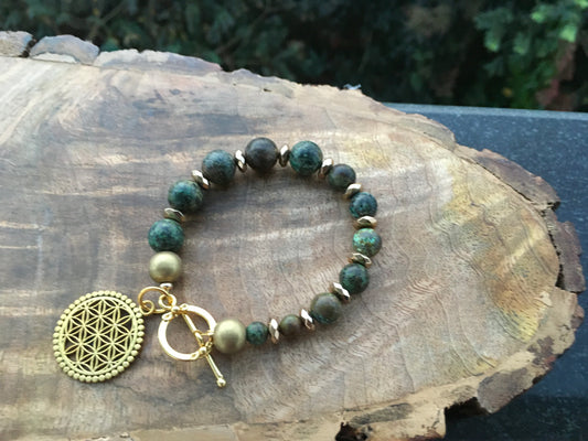 Embodied with the beauty of African turquoise and featuring the sacred flower of life charm, this bracelet invites you to explore the journey of self discovery. TurqBraceletsSpectakWhispers