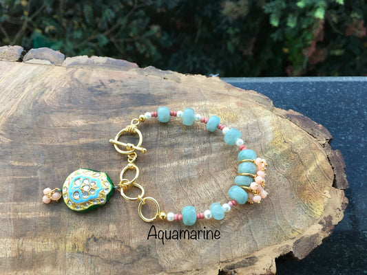 This gorgeous Aquamarine bracelet with a minakari charm feels like a breath of fresh air. May it empower you to let go of fears and past traumas and purify your mindBraceletsSpectakOceans Breath