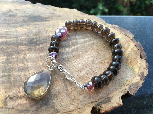 Amplify your intentions with the grounding energies of this gorgeous Smokey Quartz bracelet.  Smokey Quartz is known to protect against negative energy, promote emotBraceletsSpectakSmoke