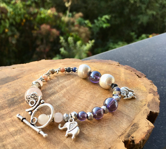 May this multi crystal bracelet connect you with all the love energy that permeates everything in this magnificent world. The super cute elephant charms symbolize stBraceletsSpectakRise