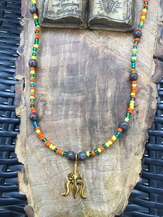 Embody the power of Shiva with this stunning chocolate labradorite necklace featuring the sacred Trishul pendant. Symbolizing protection, balance and intuition, clarNecklacesSpectakShiva Power