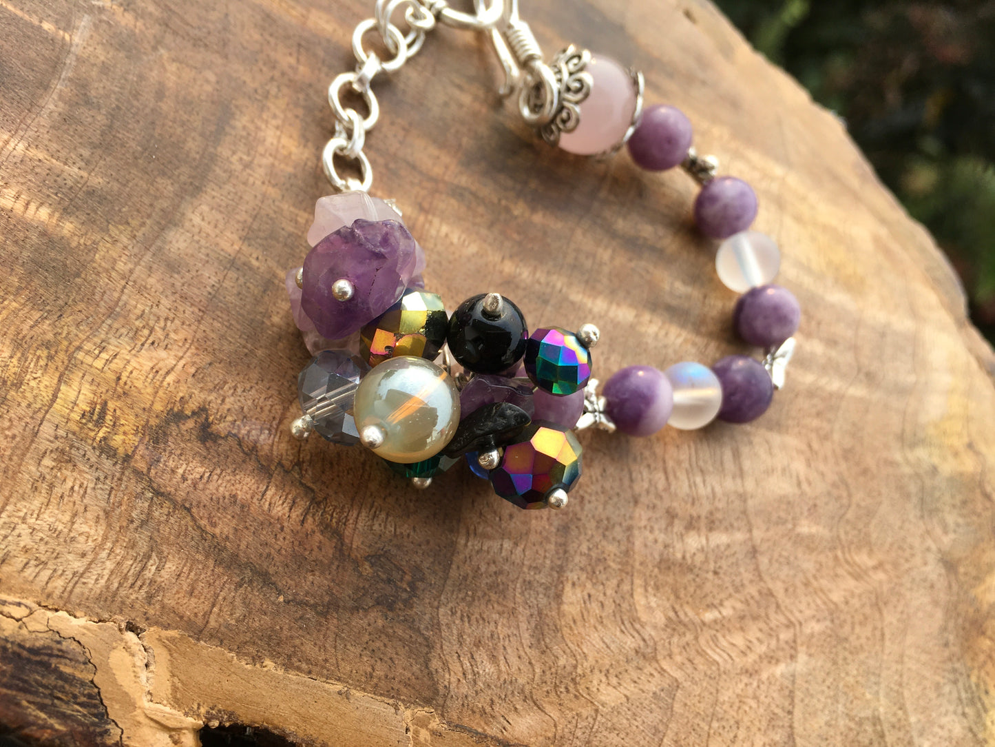 Chiyo in kanji means a thousand generations.
This lepidolite and rose Quartz bracelet is a poignant nod to all the family members who came before us. Which is why itBraceletsSpectakChiyo