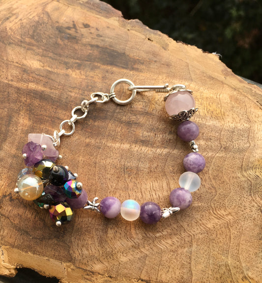 Chiyo in kanji means a thousand generations.
This lepidolite and rose Quartz bracelet is a poignant nod to all the family members who came before us. Which is why itBraceletsSpectakChiyo