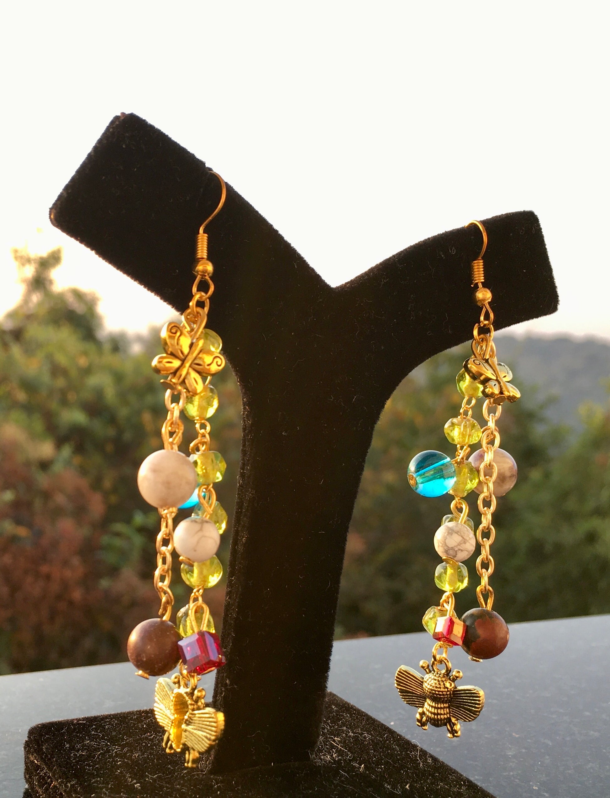 Bring a smile and reminisce of childhood joy, with soothing Howlite and jasper. Accompanied by the adorable teddy bear accent. Howlite represents calmness and sereniEarringsSpectakUrsa Oasis