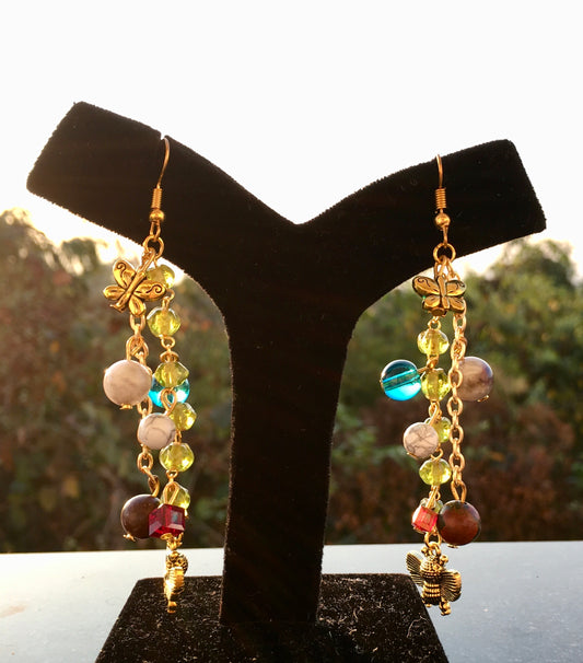 Bring a smile and reminisce of childhood joy, with soothing Howlite and jasper. Accompanied by the adorable teddy bear accent. Howlite represents calmness and sereniEarringsSpectakUrsa Oasis