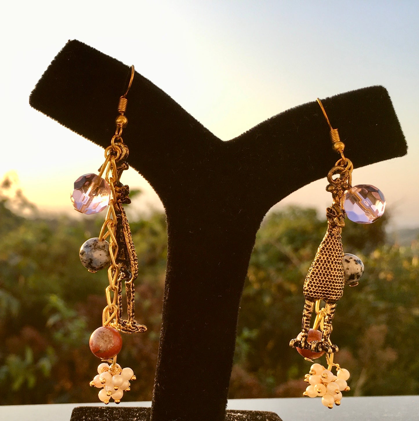 These whimsical earrings, combining sodalite, jasper and delicate pearls, balance your energy, fostering intuition, clarity and a sense of belonging. Plus they are jEarringsSpectakBig Bird Bliss