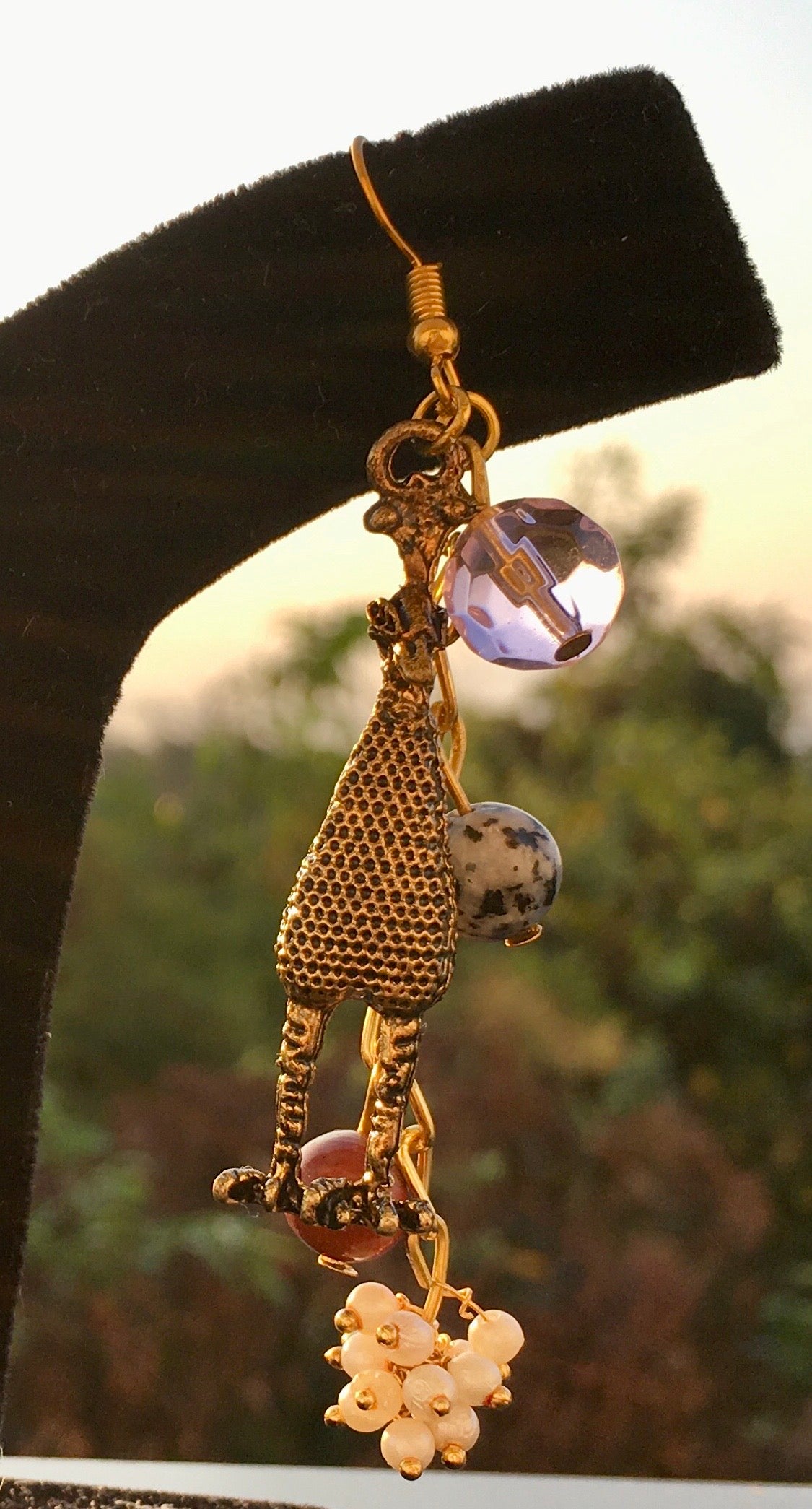 These whimsical earrings, combining sodalite, jasper and delicate pearls, balance your energy, fostering intuition, clarity and a sense of belonging. Plus they are jEarringsSpectakBig Bird Bliss