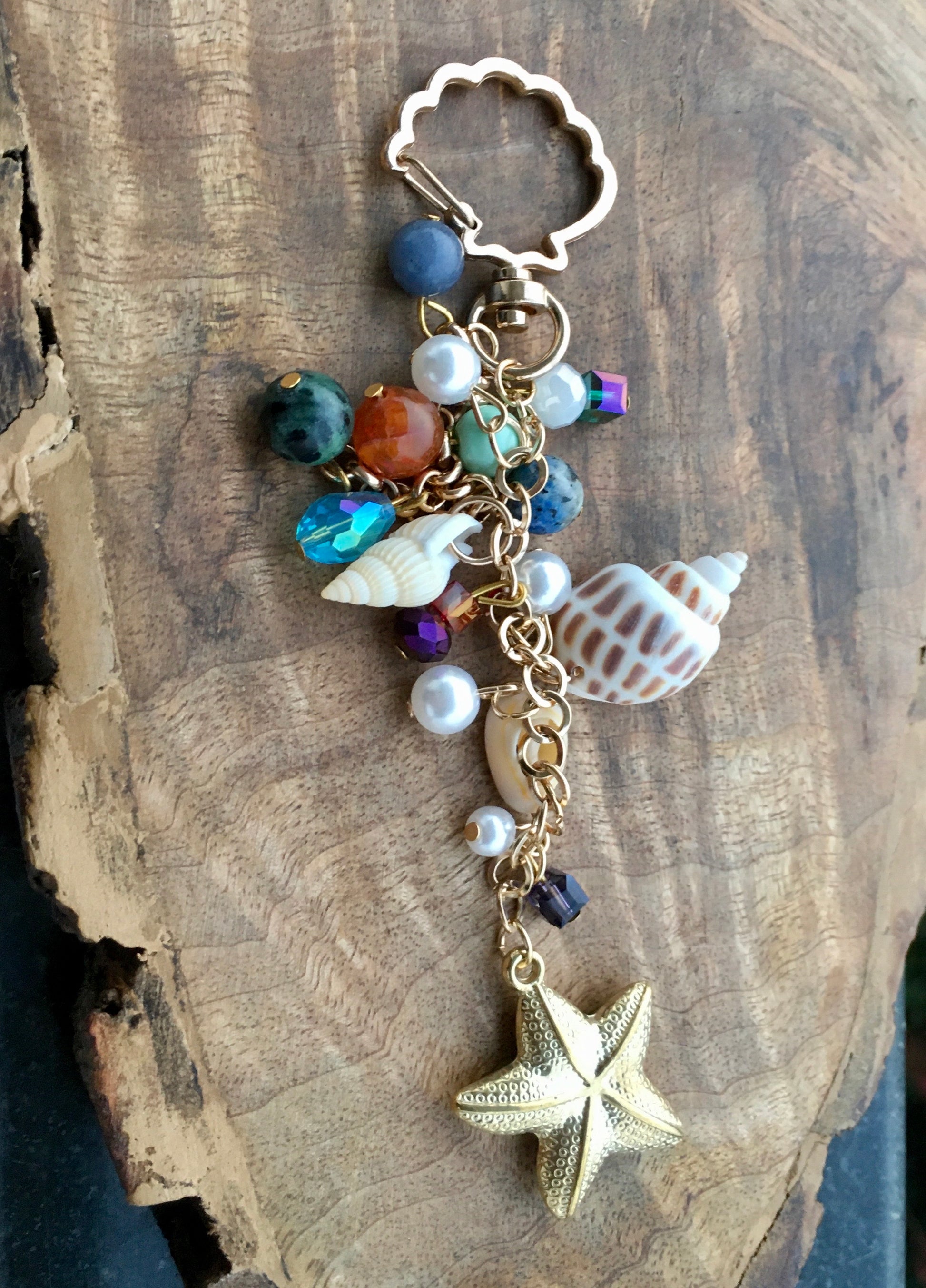 “Seas” the day! With our beautiful crystal and shell key chain.KeychainSpectakOcean Breeze