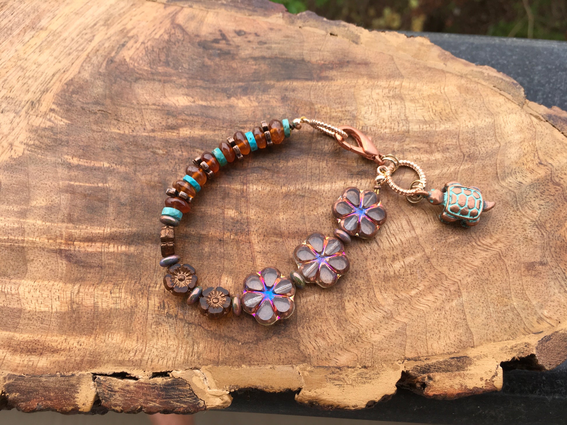 May this turquoise and hessonite garnet bracelet bring you courage, creativity,good fortune, protection,peace,prosperity and grounding. Hessonite garnet are believedBraceletsSpectakBlissful Flowering