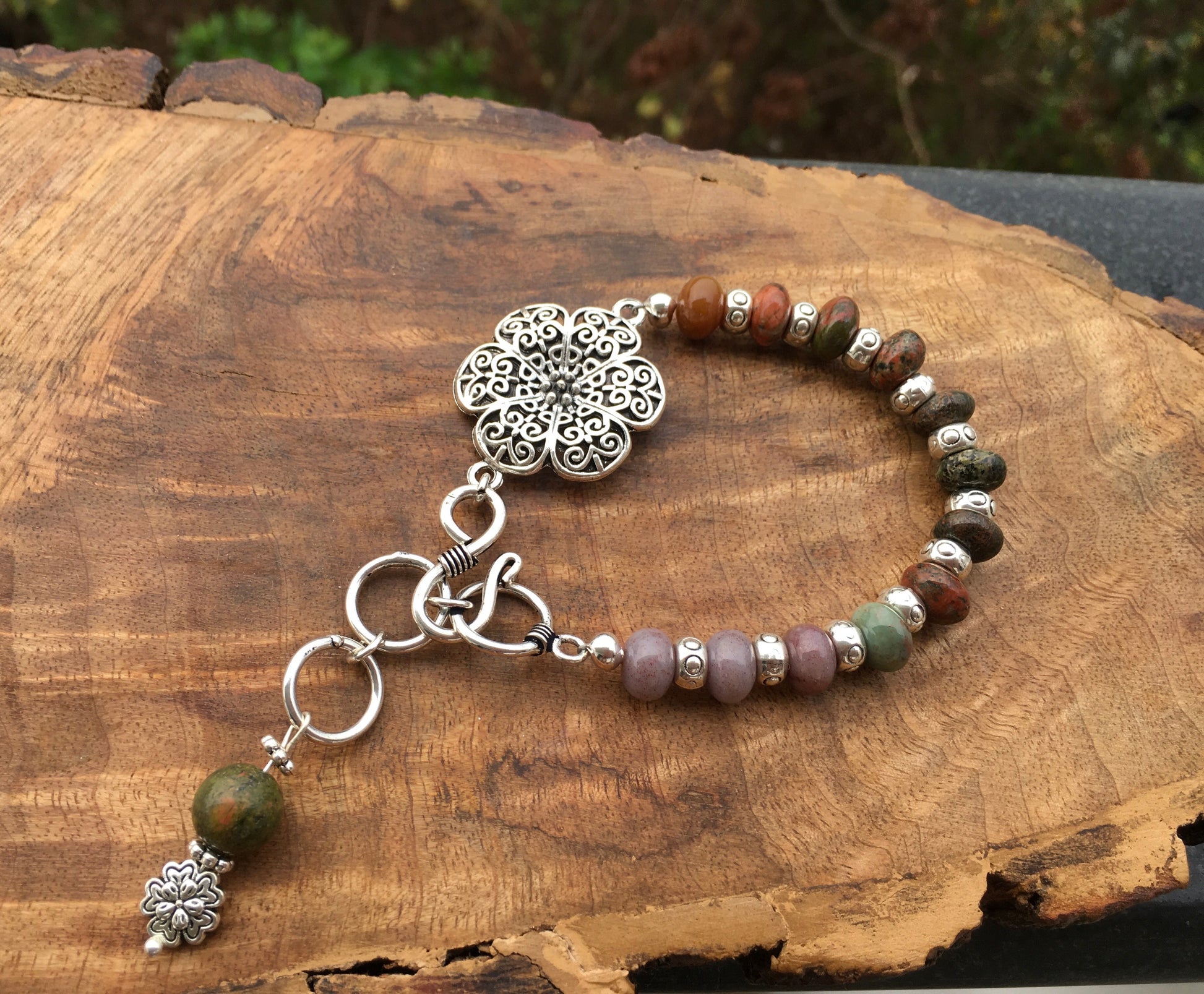 May this Unakite bracelet ground and balance your physical, emotional and spiritual beings. Unakite is connected with your third eye and is fabulous to wear during mBraceletsSpectakFlowering