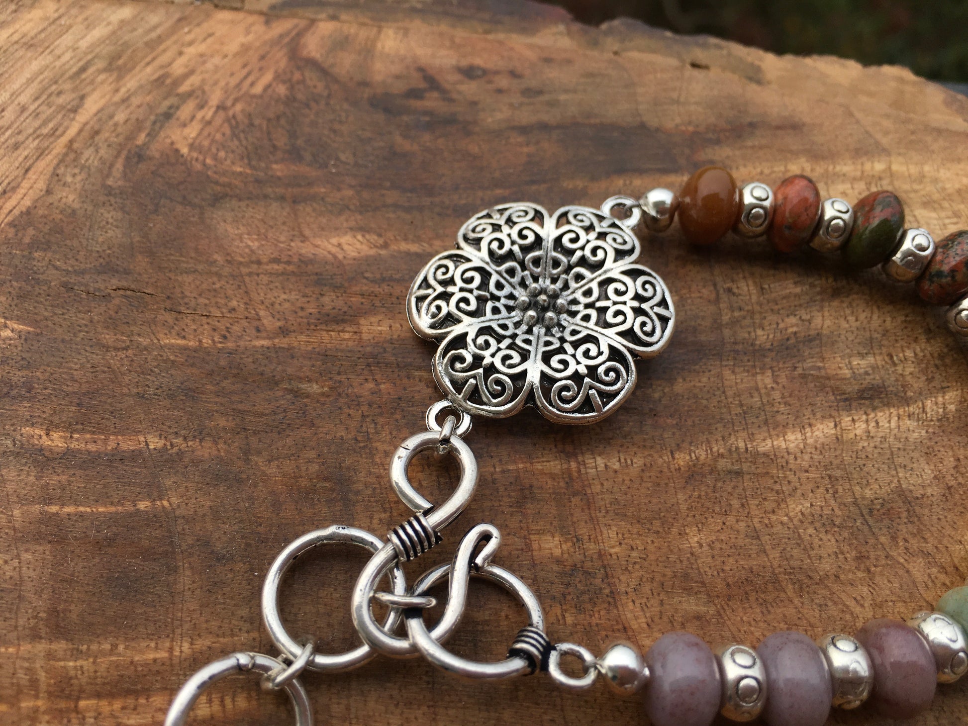 May this Unakite bracelet ground and balance your physical, emotional and spiritual beings. Unakite is connected with your third eye and is fabulous to wear during mBraceletsSpectakFlowering