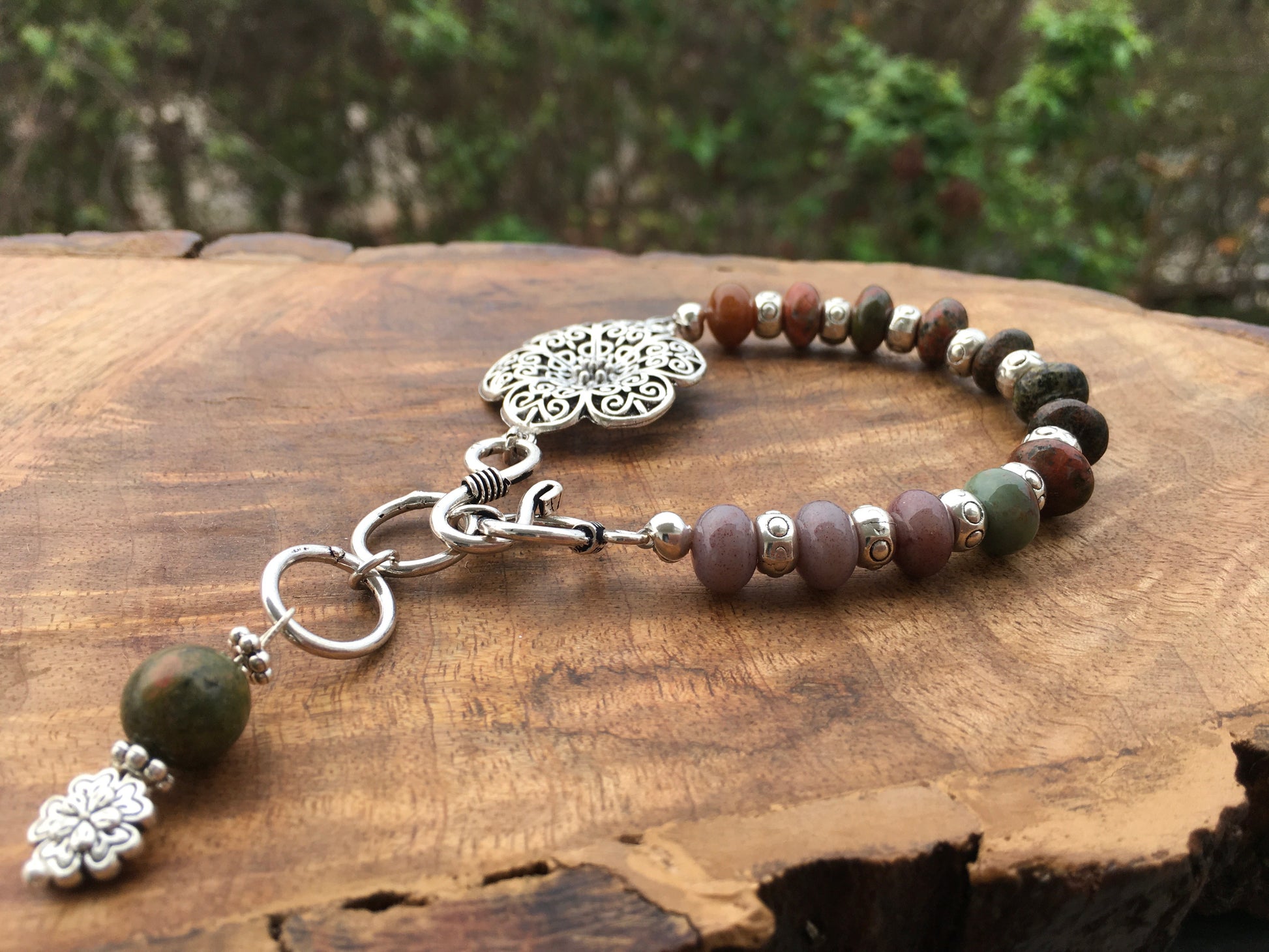 May this Unakite bracelet ground and balance your physical, emotional and spiritual beings. Unakite is connected with your third eye and is fabulous to wear during mBraceletsSpectakFlowering