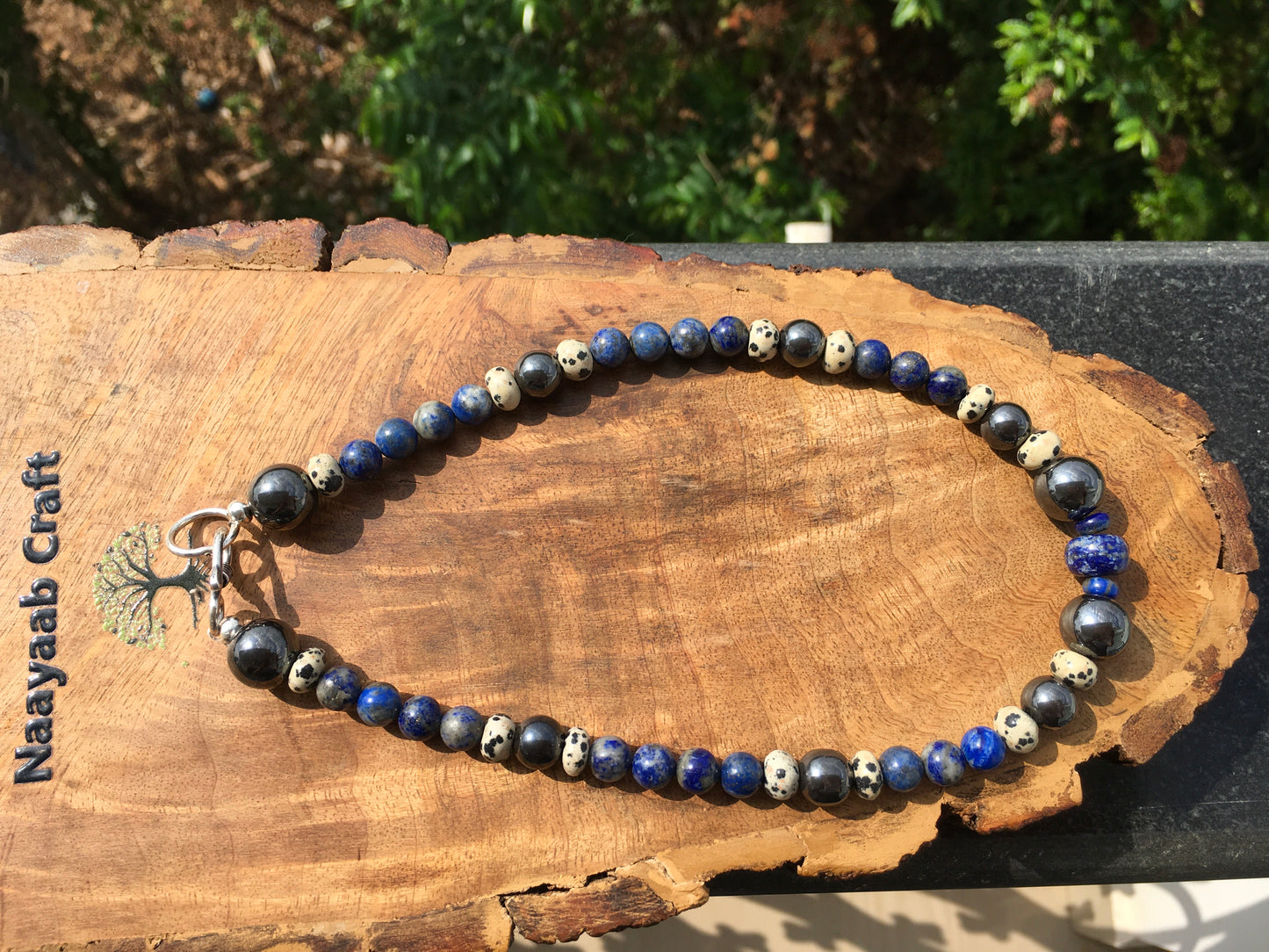 Embody the powerful energies of Hematite, Lapis lazuli and Dalmatian Jasper with this amazing necklace.
Hematite grounds, protects and promotes inner strength and peNecklacesSpectakMindful Warrior