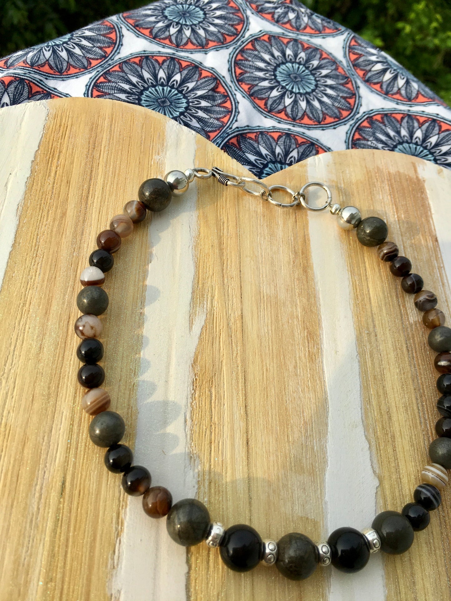 This energetic Sulemani Hakik,obsidian and pyrite necklace is an essential piece of jewelry for those that need,financial abundance, emotional balance and stability,NecklacesSpectakNubian Knight