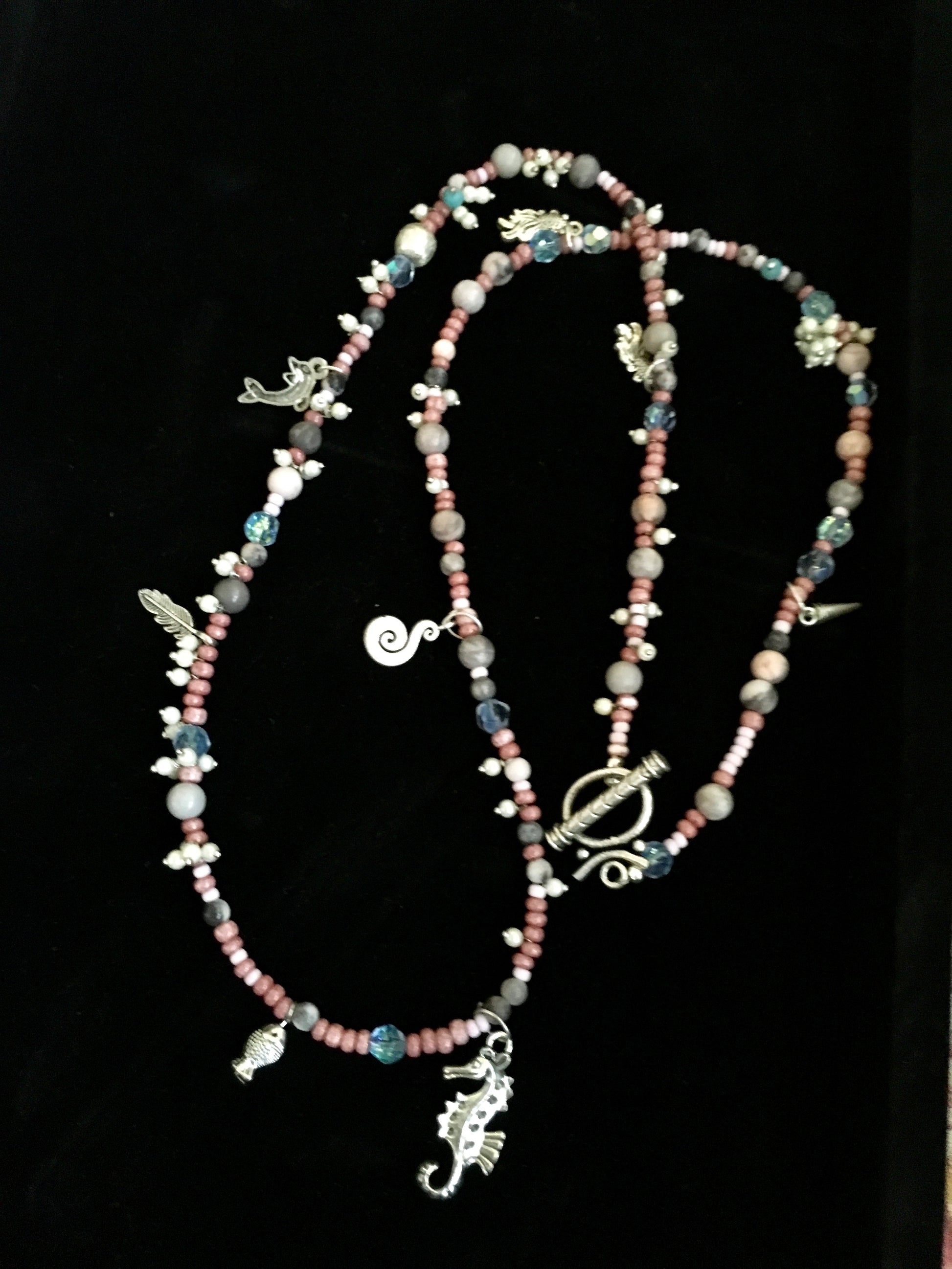 May this ocean themed jasper necklace transport you to the sunny beaches of goa. Dive into the depths of serenity, and connect with the oceans energy, embracing peacNecklacesSpectakCoastal Charm