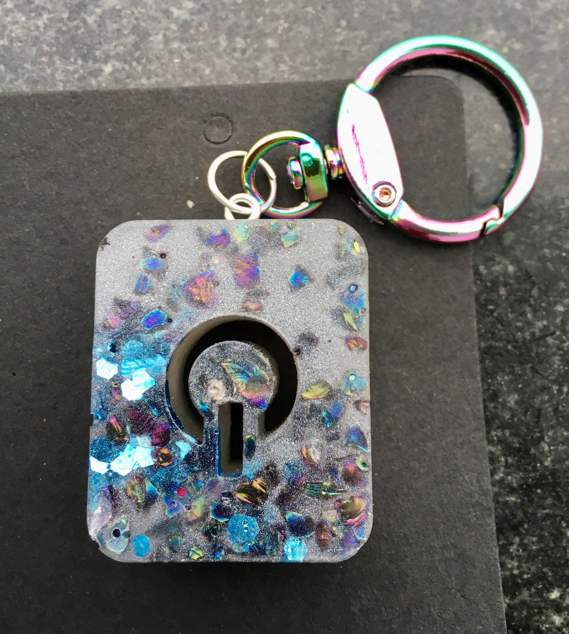 Unlock your potential and tap into your inner power with our POWER keychain , with crystal chips.KeychainSpectakEm-Power-ment