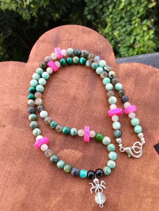 Connect with the oceans energies through this multi crystal necklace with a whimsical silver octopus pendant. Allow it to amplify your intentions to manifest calmnesNecklacesSpectakTentacles